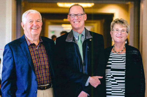 Bill and Joyce Cummings with Dr. Paul Farmer